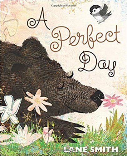 A Perfect Day A Perfect Day book cover with a sleeping brown bear in a meadow and a bird flying. Summer read alouds for kids.