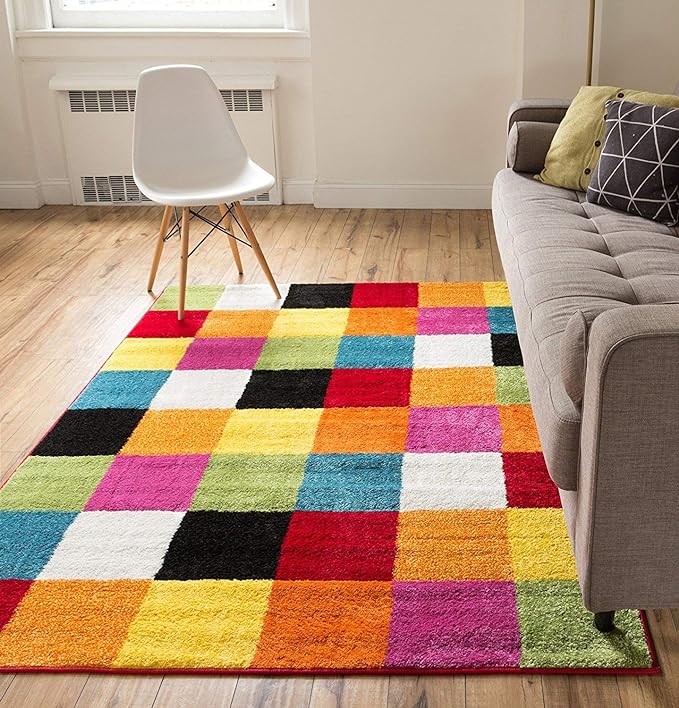 Colorful-Square-Rug A rug is made up of rainbow colored squares.