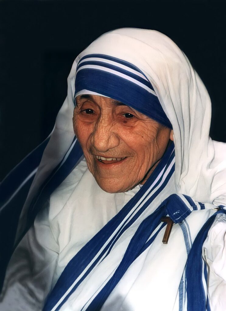 Mother Theresa Mother Theresa wearing white and blue.