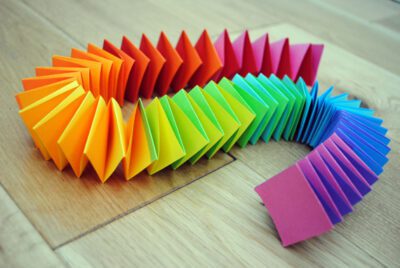 rainbow-paper-garland A colorful snake of paper squares folded together
