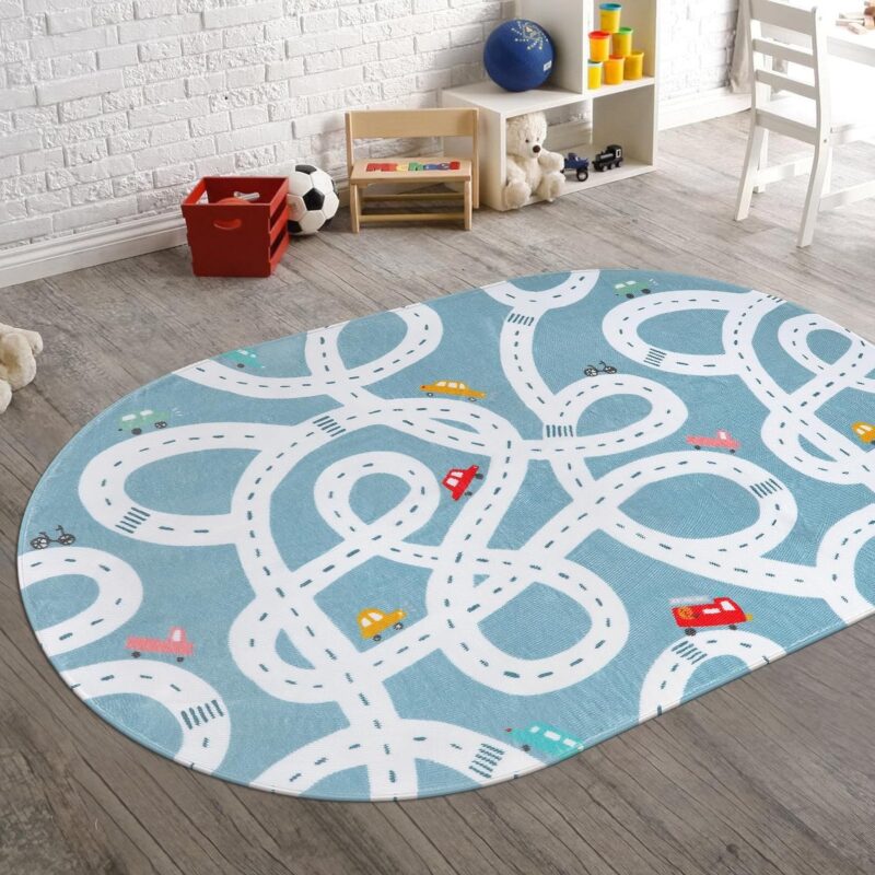 Roadway-Rug An oval rug has white roadways all over it with a few cars. The background is blue in this example of classroom rugs.