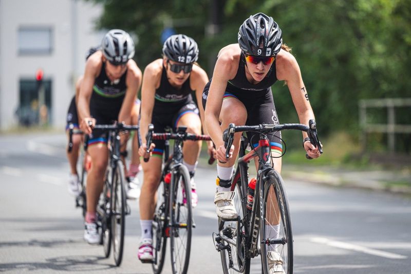 Picture Prompts: Bicycle Race Three people competing in a bicycle race