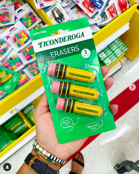 big-erasers A teacher's hand holding a three pack of Ticonderoga erasers as an example of dollar store hacks for the classroom