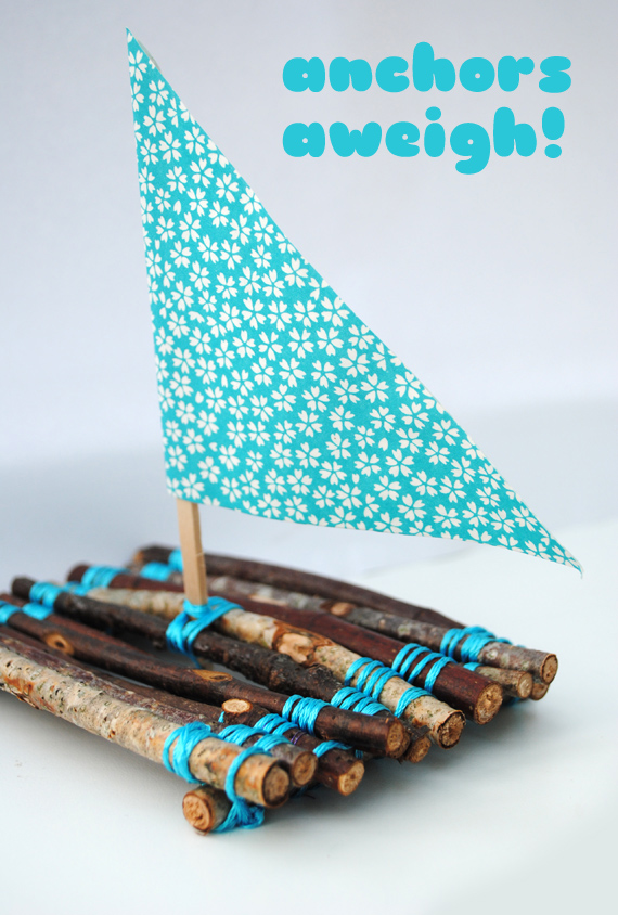 boat-twiggy A simple raft made from twigs laced together with a triangular fabric sail