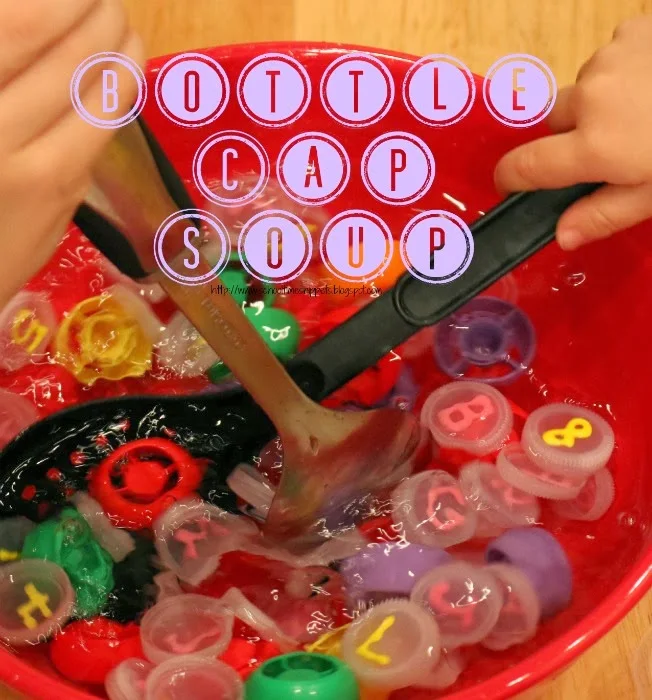 bottle-cap-sensory-play bottle caps in a bowl with water for water activity