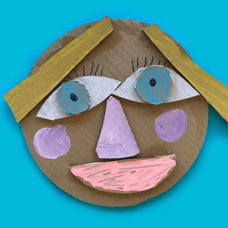 Collage Faces A face is constructed from cardboard pieces that have been painted.