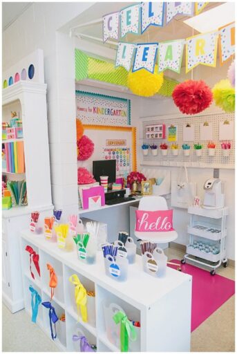 Color coded kindergarten classroom with pen buckets in all different colors