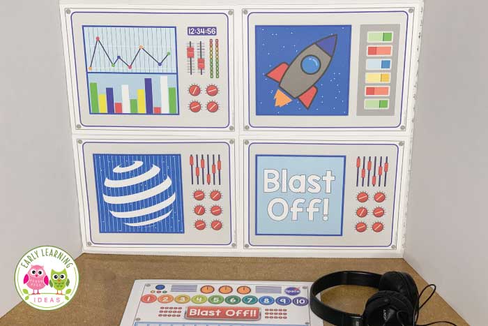 Several pictures are on a board that show space themed classroom images.