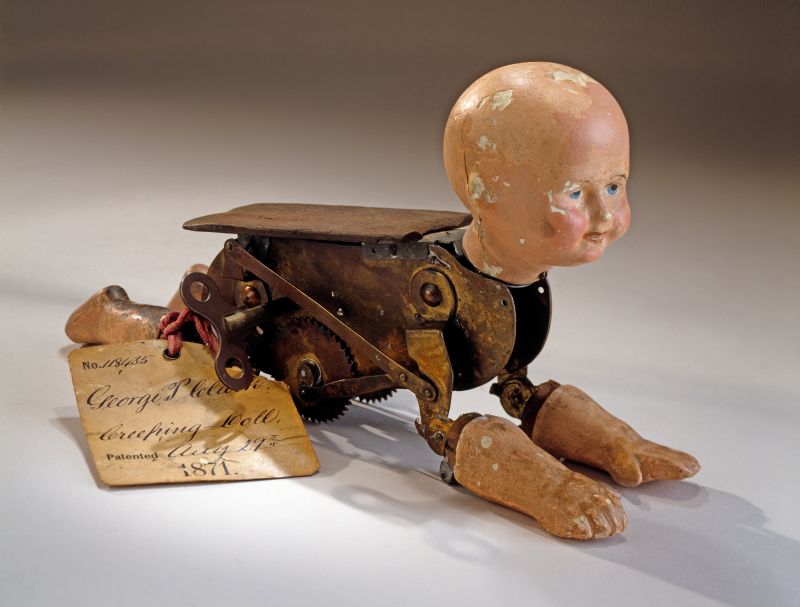 Picture Prompt: Creeping Baby Doll Creeping Baby Doll Patent Model