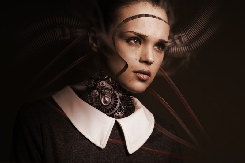 Picture Writing Prompts: Cyborg Girl An altered image showing a young girl in a black dress with a white collar, with a neck made of mechanical gears