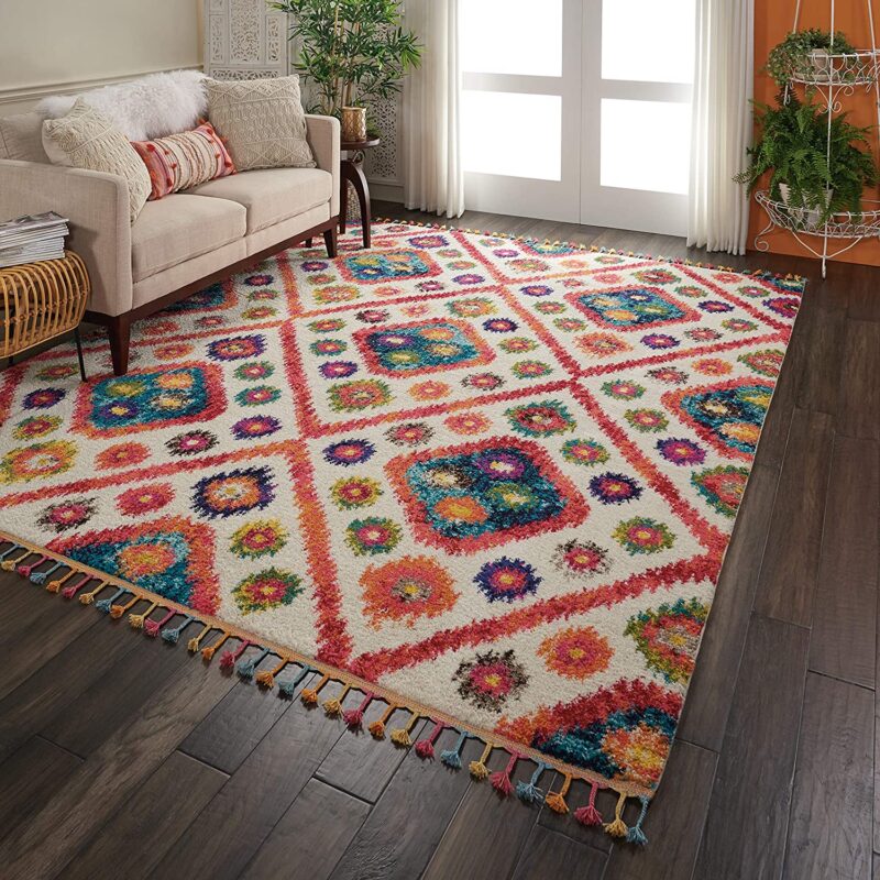 Diamond Rug Colorful patterned rug with tassels.