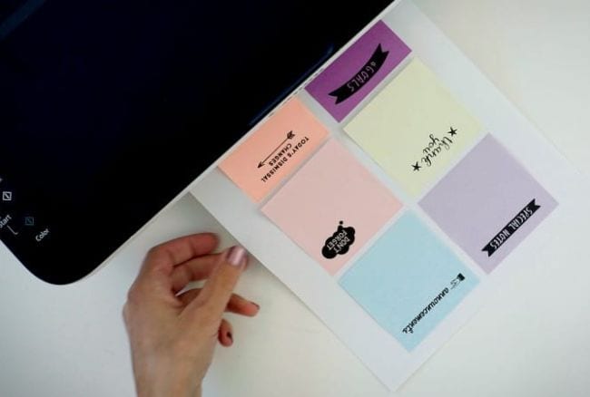 Dollar Store Hacks; Sticky Notes Page of sticky notes coming out of a printer
