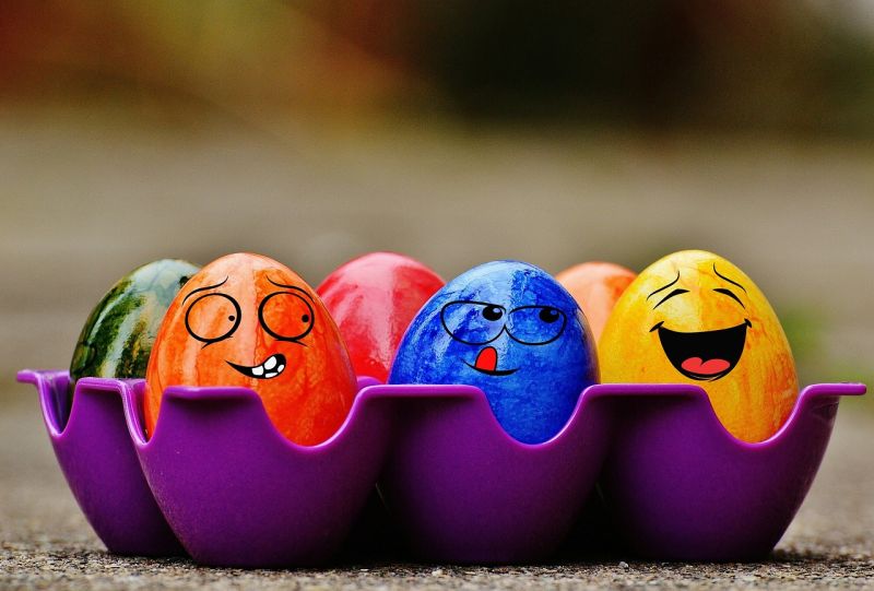 Writing Prompt: Egg Faces A carton of colorful eggs with faces drawn on them
