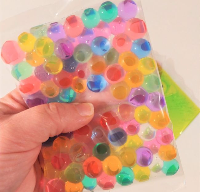 Fidget Toys: Squish Panel Fidgets for kids: Sealed plastic bag filled with water beads in bright colors