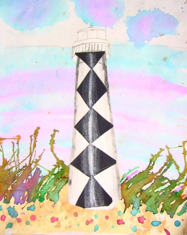 Fifth Grade Art Watercolor Lighthouses Black and white lighthouse standing on a beach with a watercolor pastel sky