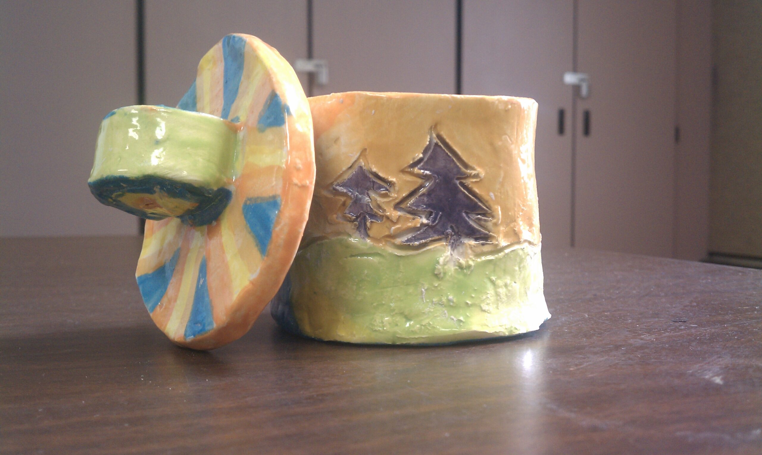 Clay Pot With Lid A simple clay pot with a lid, with a forest design