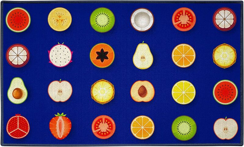 Fruit Rug A blue rug has different fruit slices making up the 23 seats in this example of classroom rugs.