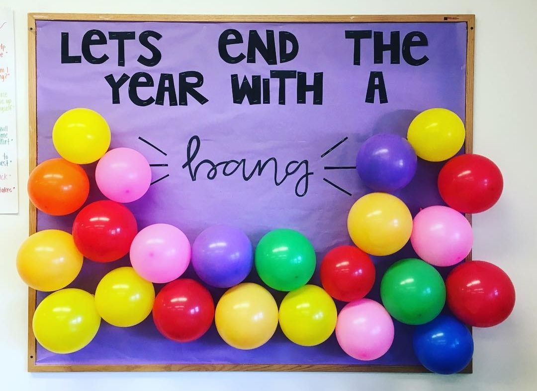 Interactive Bulletin Boards: Balloons Bulletin board covered in inflated balloons, with text reading Let's end the year with a bang!