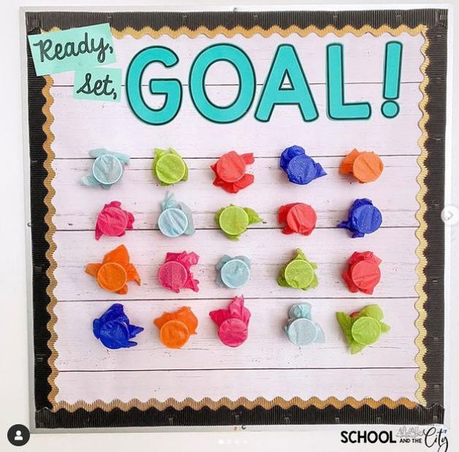 Interactive Bulletin Boards: Ready Set Goal Ready Set Goal bulletin board with cups covered with tissue paper that can be punched out to find prizes