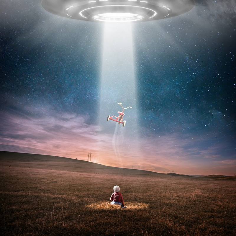 Picture Writing Prompts: UFO Small child sitting in a field watching a flying saucer beam up its tricycle (Middle School Picture Writing Prompts)
