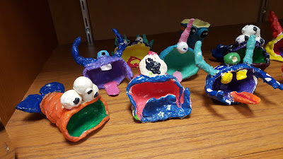 Punch Pot Monsters Clay punch pots turned into big-mouth monsters as a fourth grade art project