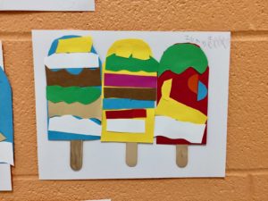 Kindergarten Art Projects: Popsicle Three popsicles on white paper are constructed from strips of construction paper.
