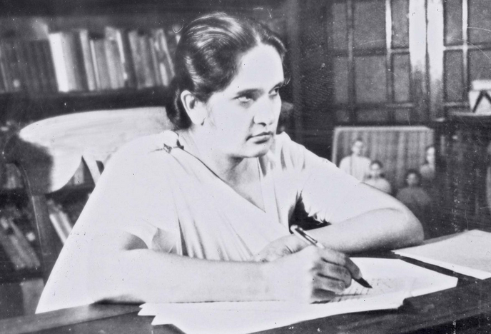 siri_banda sirimavo bandaranaike prime minister of sri lanka sitting at a desk