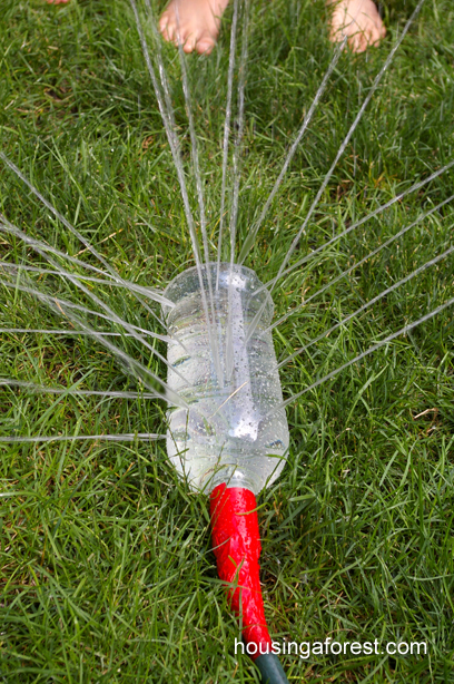 sprinkler plastic bottle filled with water for a sprinkler