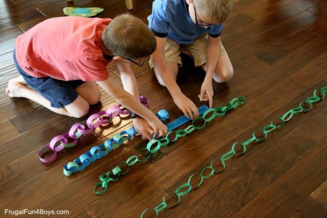 paper-chains Two students measuring paper chains