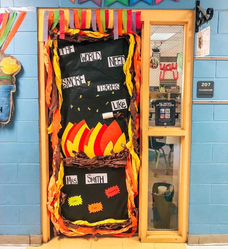 Teacher Appreciation Week Door Classroom door decorated with a campfire and marshmallows. Text reads "We need s'more teachers like you."