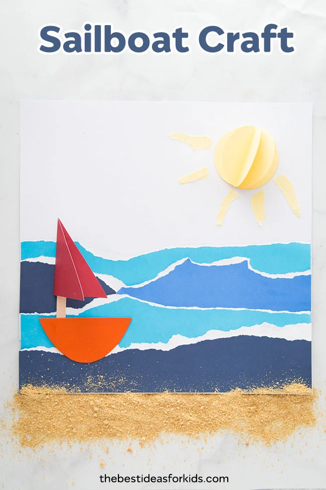torn-paper-sailboat A red sailboat floats on a brilliant blue sea in this seascape made from torn paper