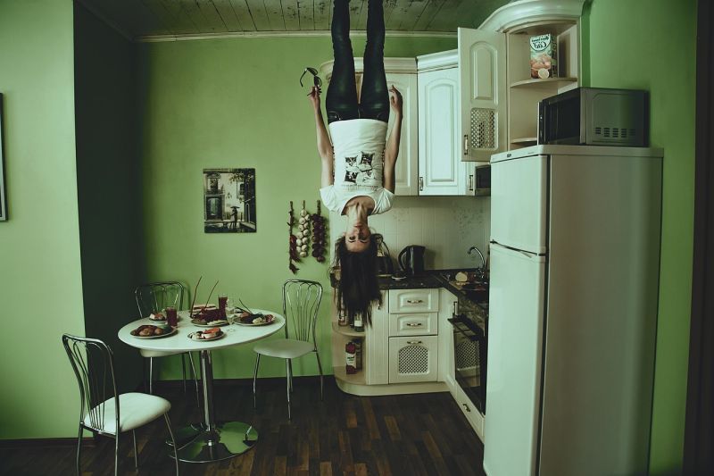 Writing Prompt: Upside Down Woman hanging upside down from the ceiling in a kitchen