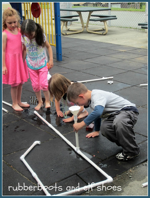 Water-Pipes kids playing with P V C pipes