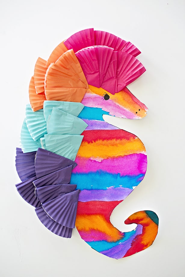 watercolor-seahorse A colorfully striped sea horse art project as an example of summer crafts for kids
