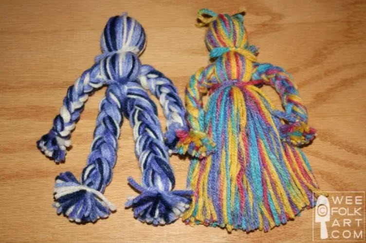 Yarn Folk Art Dolls Man and woman simple folk art dolls made from colorful yarn